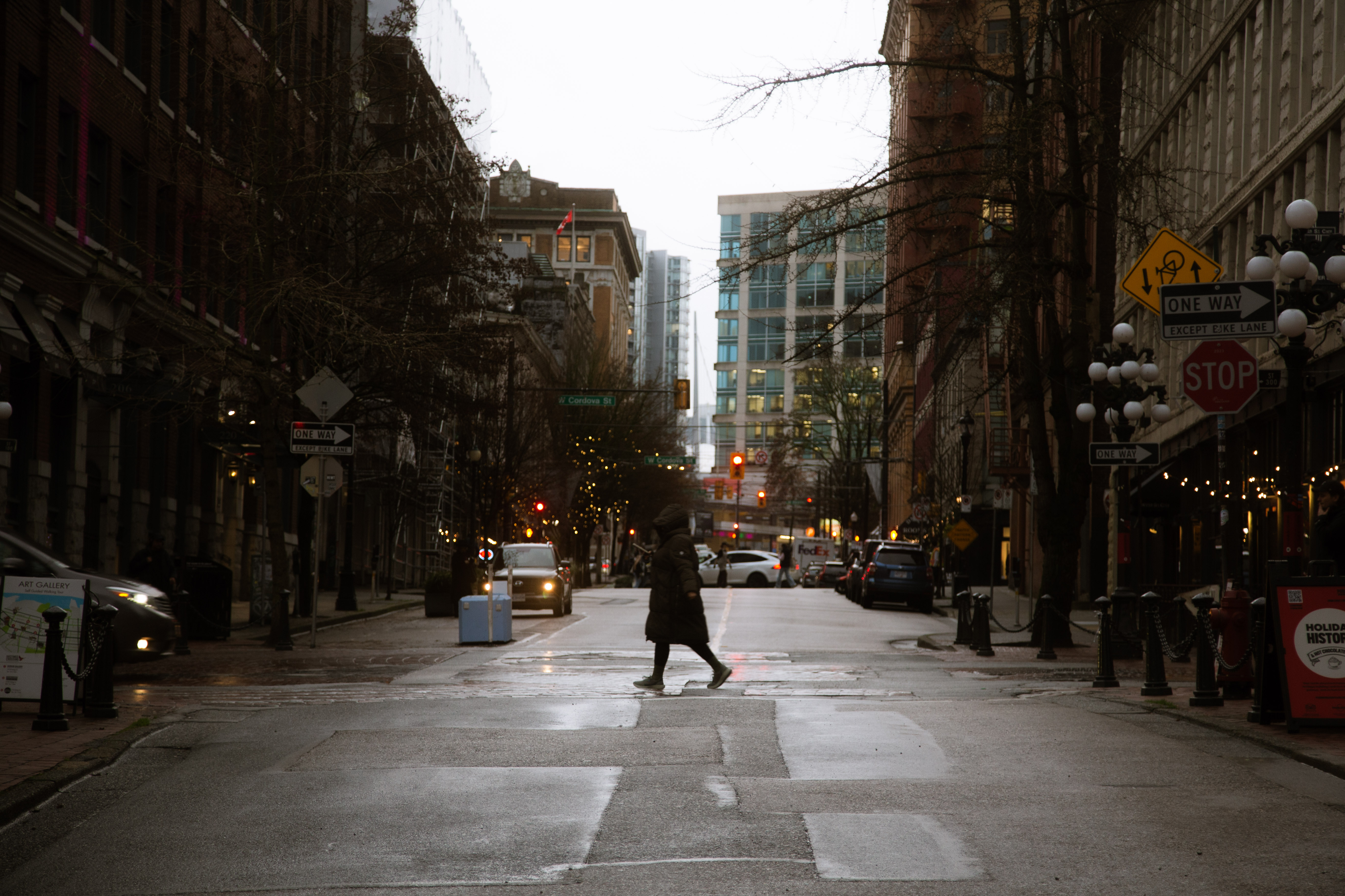 A lone figure at a crossing