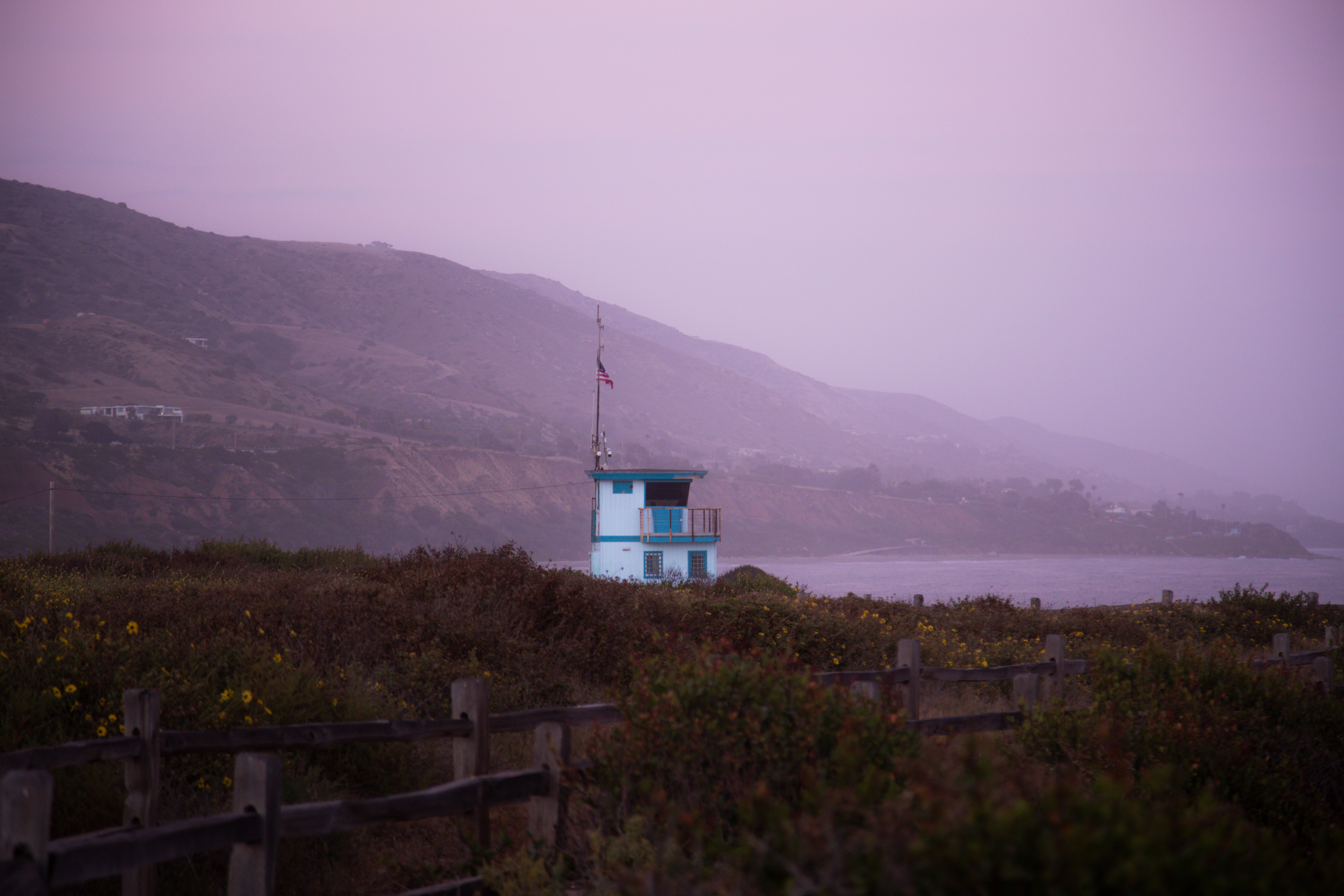 Lifeguard tower in a pink sunset